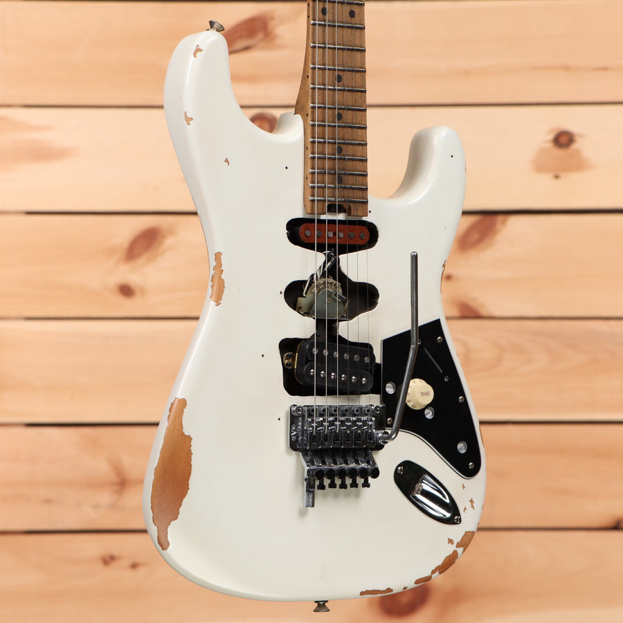 EVH Frankenstein Relic Series white electric guitar with Floyd Rose tremolo system and black pickguard