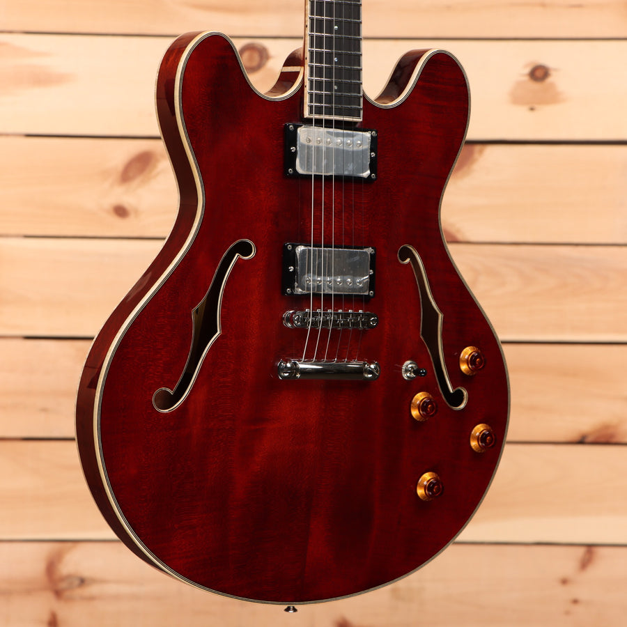 Eastman T186MX semi-hollow body electric guitar classic red with dual humbucker pickups and f-holes