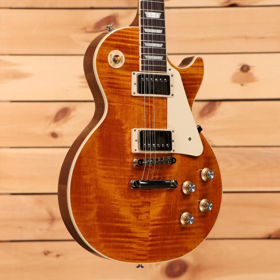 Gibson Les Paul Standard 60s Figured Top electric guitar Honey Amber with flamed maple top and dual humbuckers