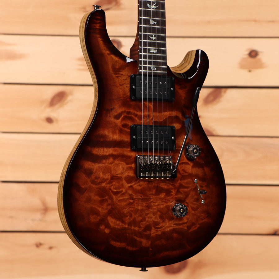 Paul Reed Smith Custom 24 Wood Library electric guitar Copperhead Burst with quilted maple top and dual humbuckers