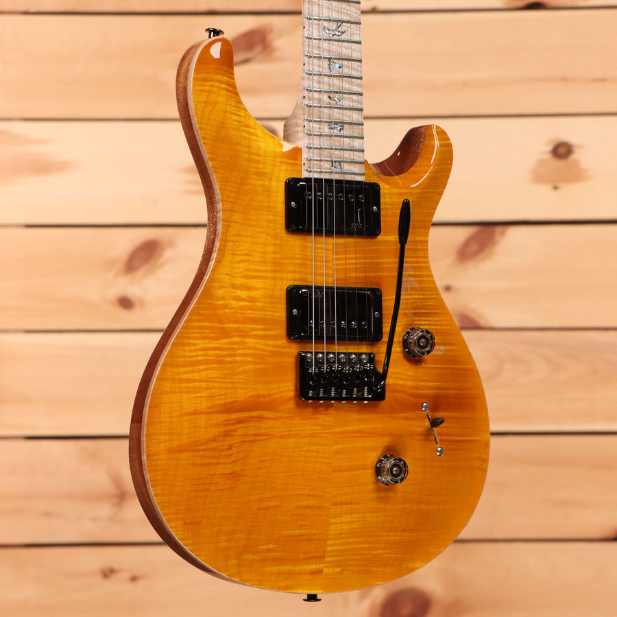 Paul Reed Smith Custom 24 Wood Library electric guitar Santana Yellow with flamed maple top and dual humbuckers