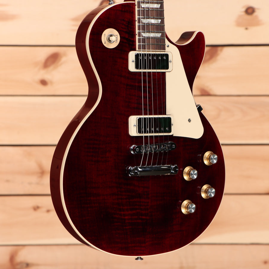 Gibson Les Paul 70s Deluxe wine red electric guitar with dual humbucker pickups and cream binding