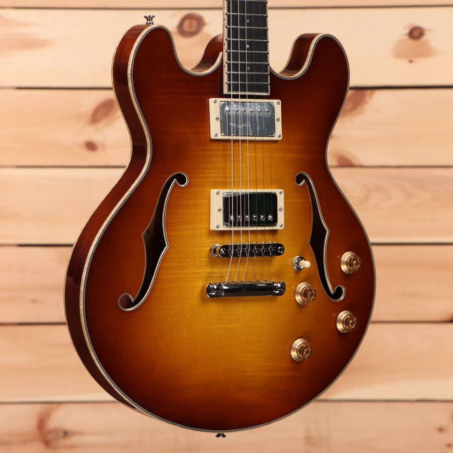 Eastman T185MX semi-hollow electric guitar Goldburst finish with dual humbucker pickups and f-holes