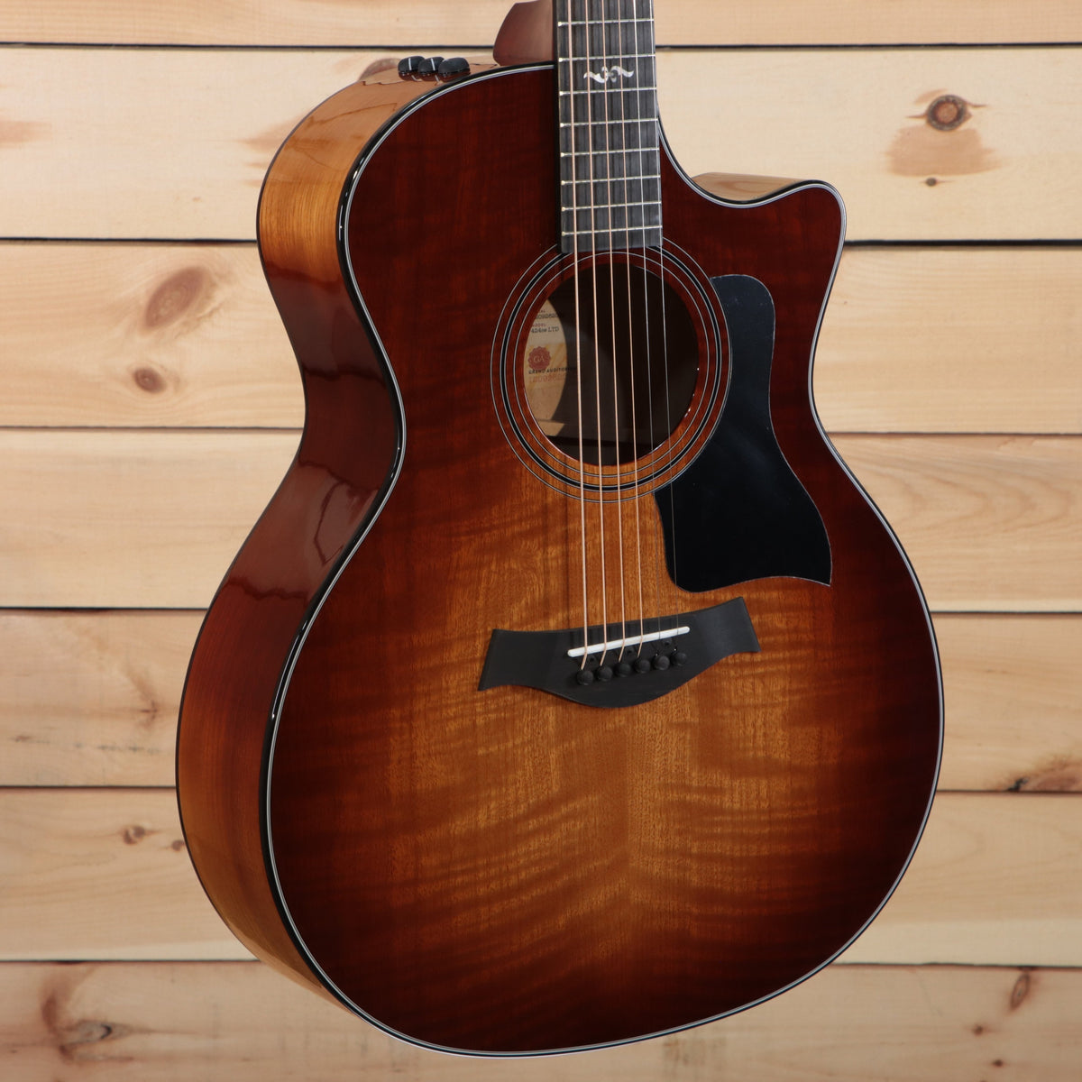 http://righteousguitars.com/cdn/shop/products/taylor-424ce-urban-ash-ltd-wsb-express-shipping-t-634-serial-1209262099-plekd-890021_1200x1200.jpg?v=1668293717