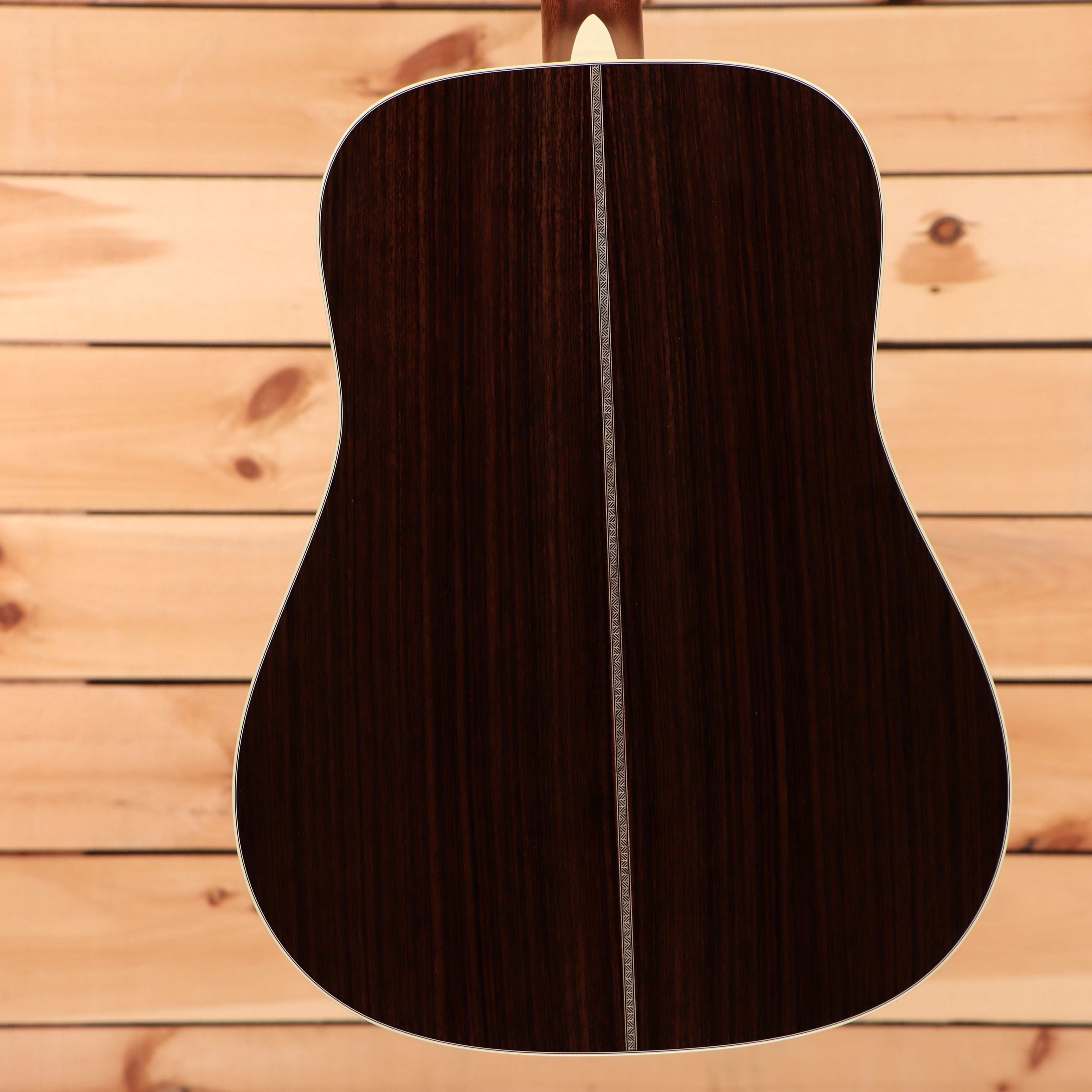 Martin HD28 dreadnought acoustic guitar Ambertone finish with white binding and rosewood back sides