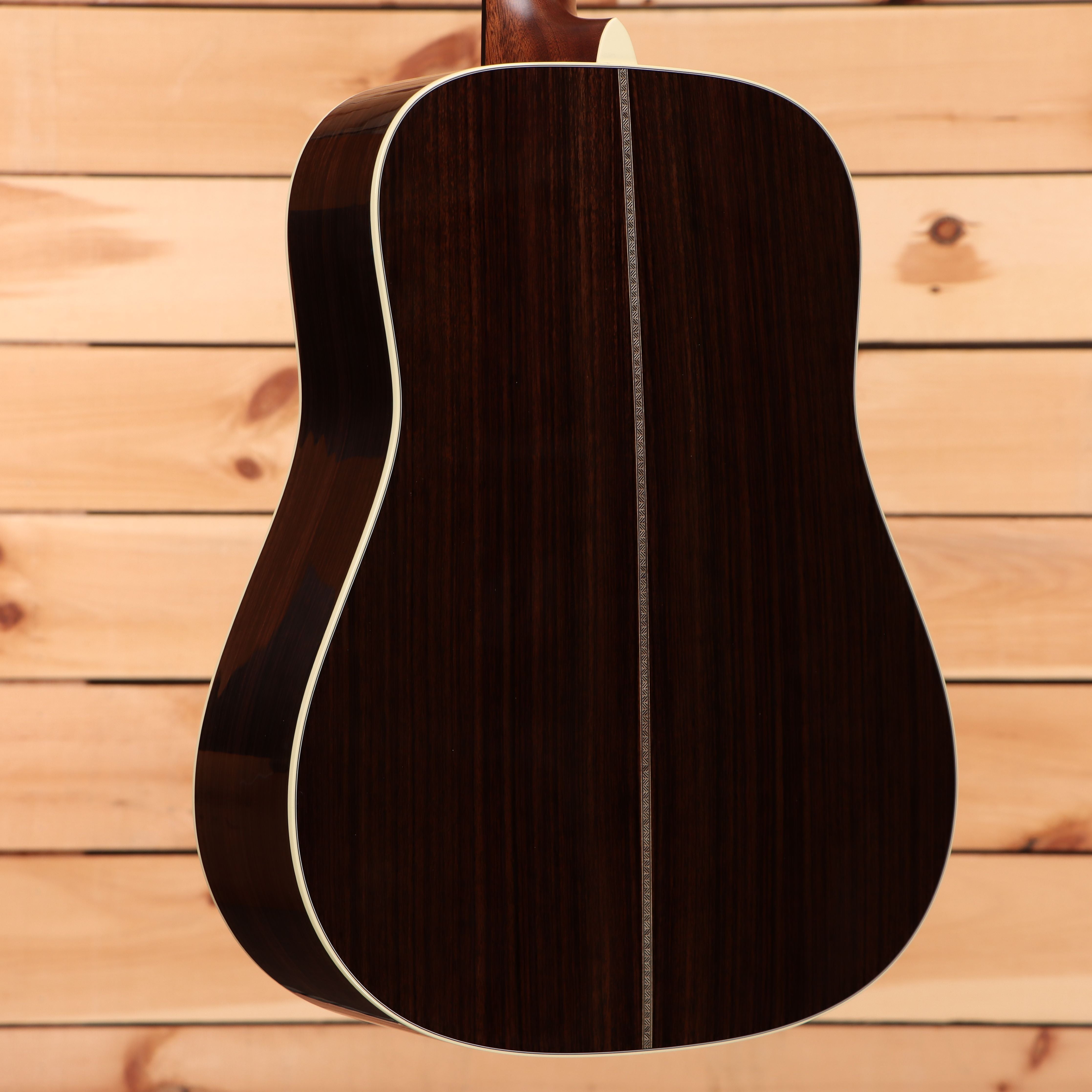 Martin HD28 dreadnought acoustic guitar Ambertone finish with white binding and rosewood back