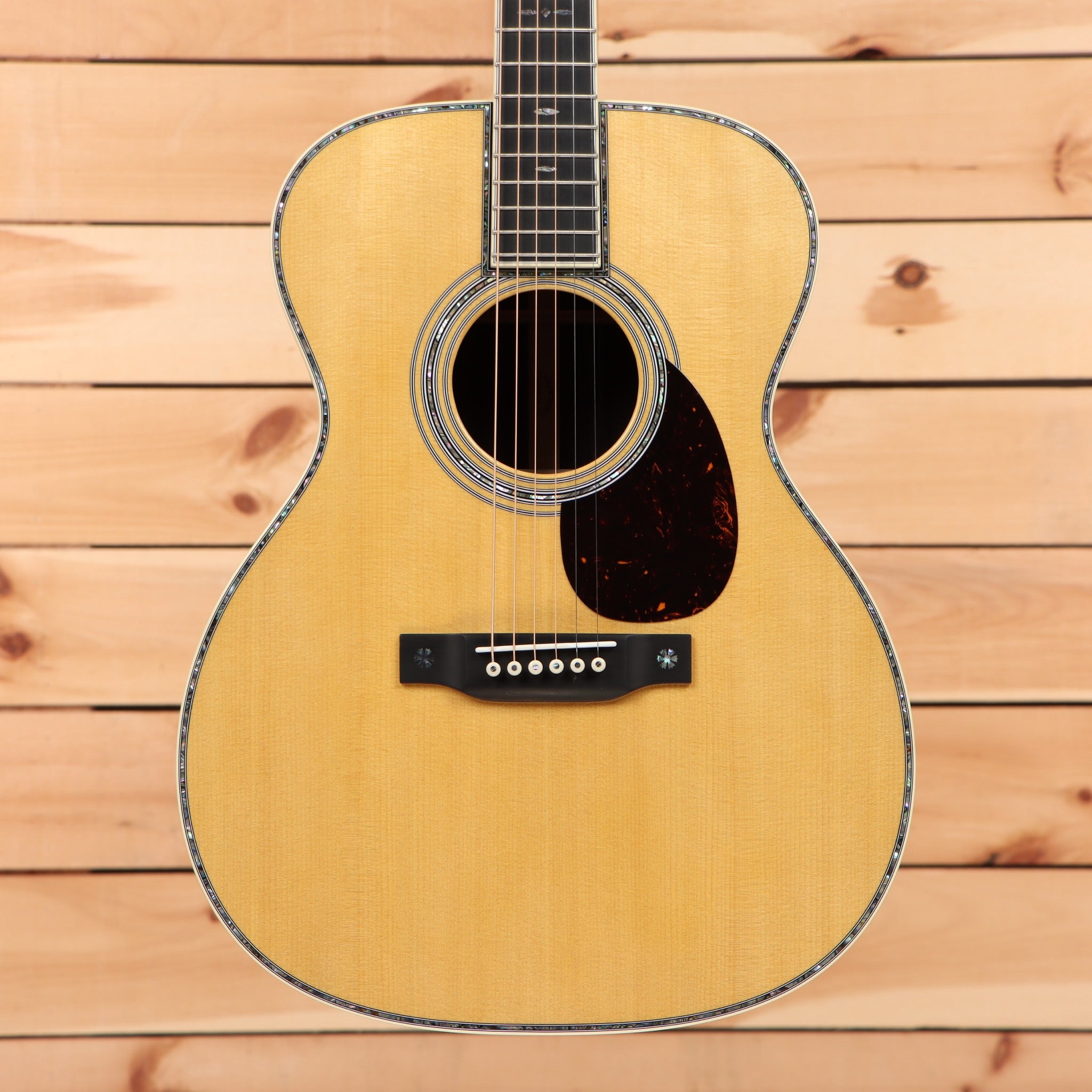 Martin OM42 natural acoustic guitar with abalone binding and 12-string configuration