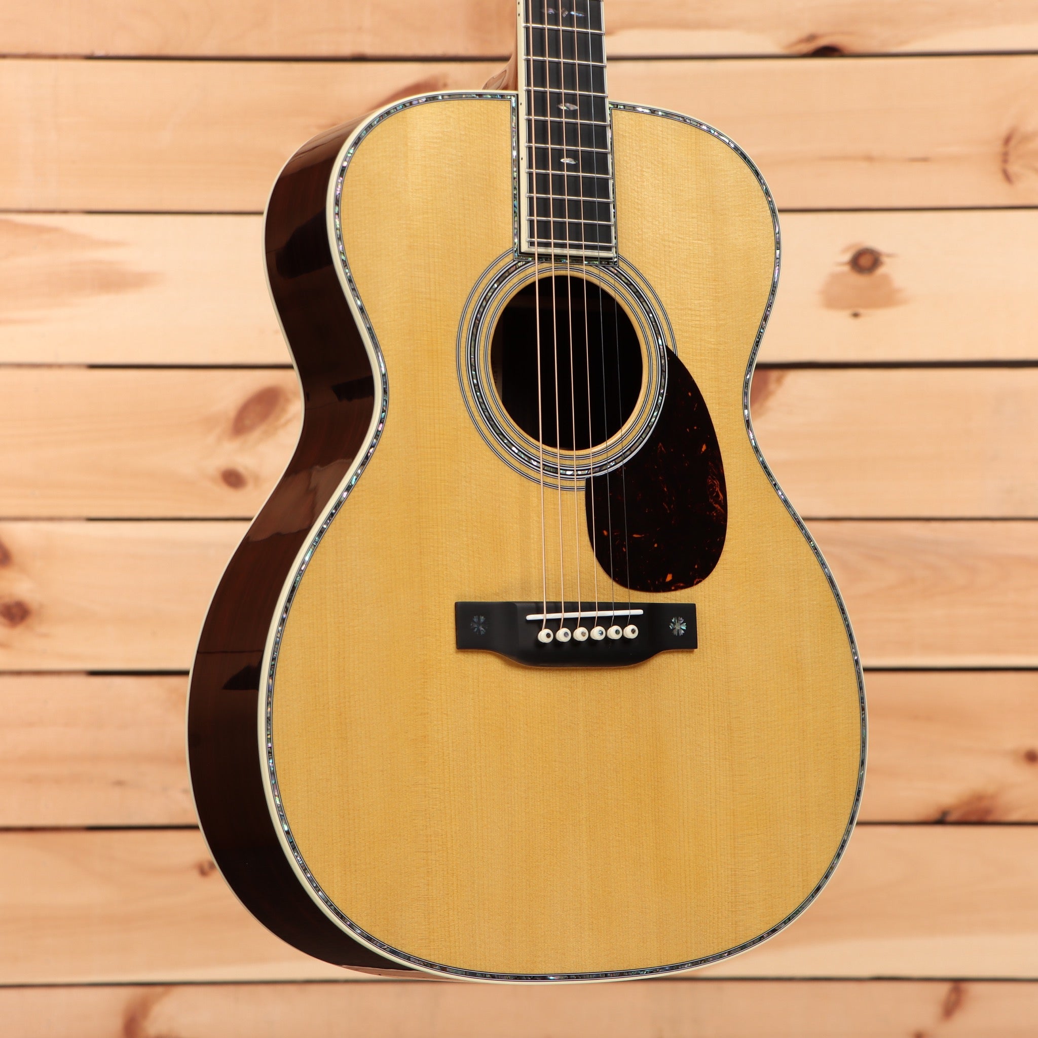 Martin OM-42 acoustic guitar natural finish with abalone binding and ebony fretboard
