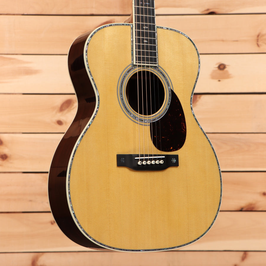 Martin OM-42 acoustic guitar natural finish with abalone binding and ebony fretboard