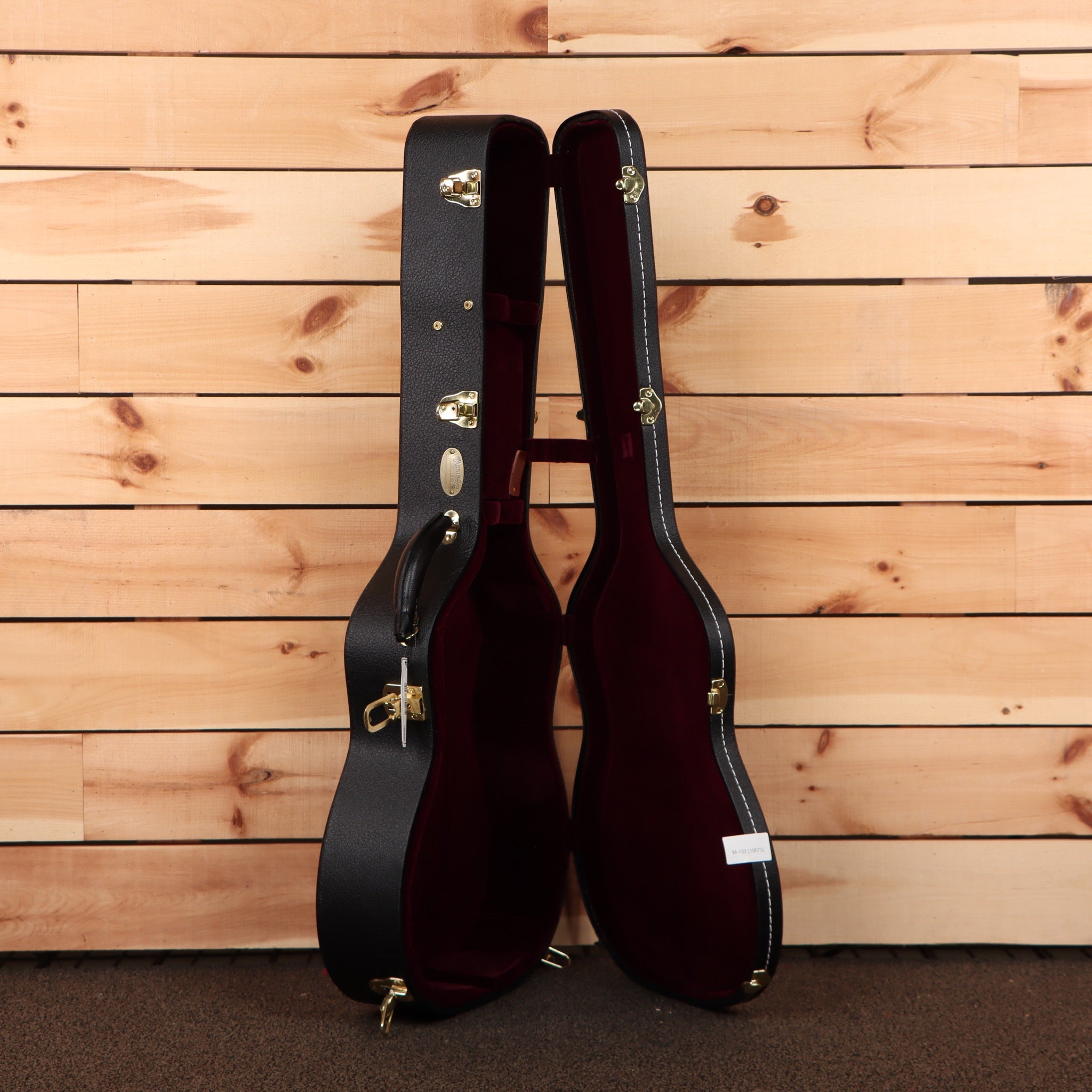 Martin OM42 acoustic guitar natural finish with gold hardware and burgundy velvet case