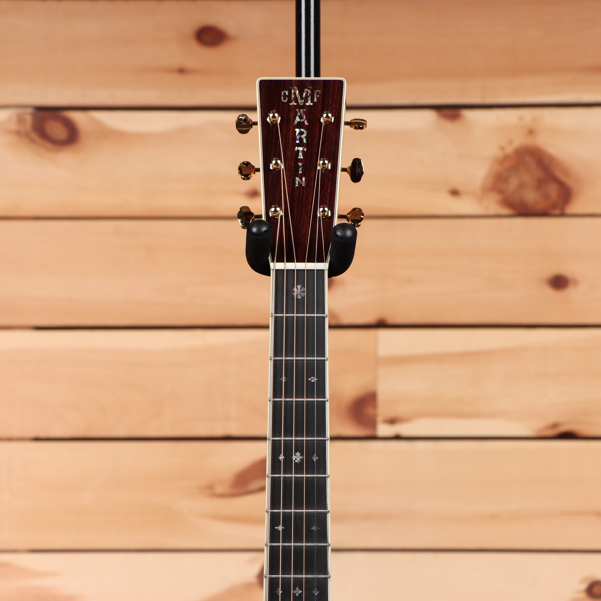 Martin OM-42 concert acoustic guitar natural finish with rosewood fretboard and inlays