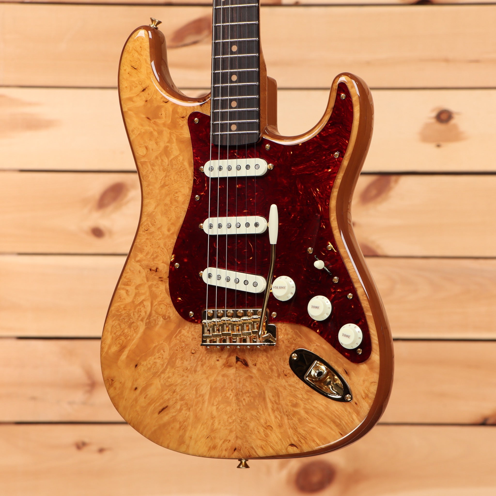 Fender Custom Shop Artisan Stratocaster electric guitar Aged Natural with maple burl body and dark red tortoiseshell pickguard