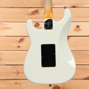 Fender Custom Shop Postmodern Stratocaster Journeyman Relic electric guitar Olympic White with single-coil pickups