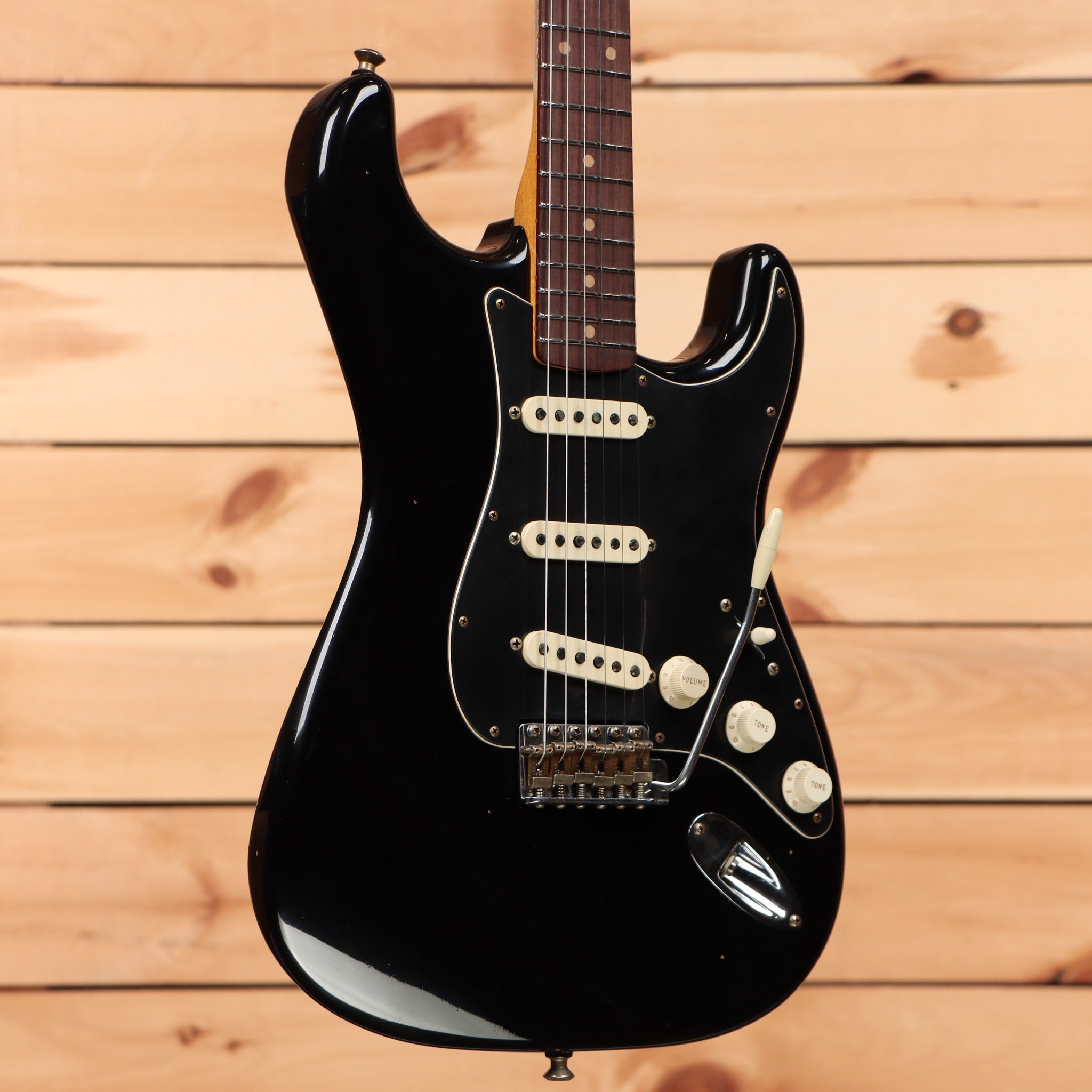 Fender Custom Shop Postmodern Stratocaster Journeyman Relic electric guitar Aged Black with three single-coil pickups