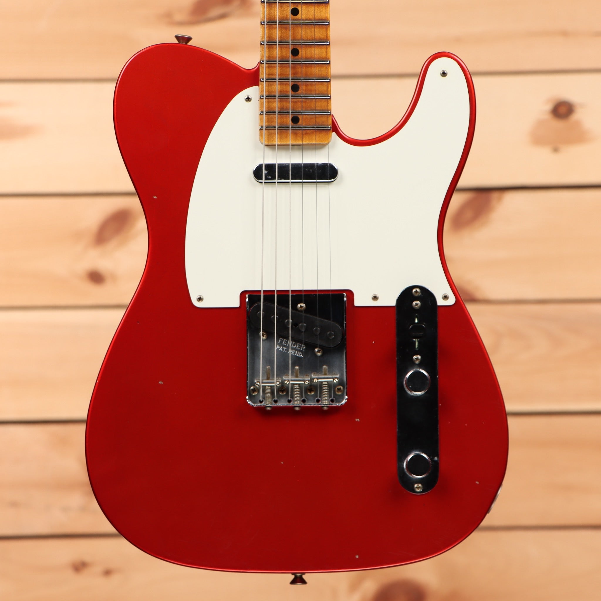 Fender Custom Shop 1957 Telecaster Journeyman Relic electric guitar Candy Tangerine with single-coil pickups