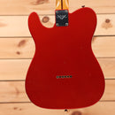 Fender Custom Shop 1957 Telecaster Journeyman Relic electric guitar Candy Tangerine with single-coil pickups