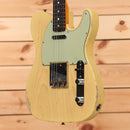 Fender Custom Shop 1964 Telecaster Relic electric guitar Natural Blonde with single-coil pickups and mint green pickguard