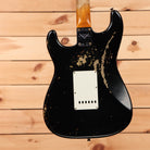 Fender Custom Shop 1960 Stratocaster heavy relic electric guitar aged black with white pickguard and single-coil pickups