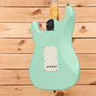 Fender Custom Shop Postmodern Stratocaster Journeyman Relic Aged Surf Green electric guitar with white pickguard