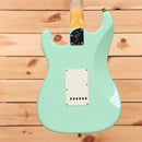 Fender Custom Shop Postmodern Stratocaster Journeyman Relic electric guitar Aged Surf Green with single-coil pickups