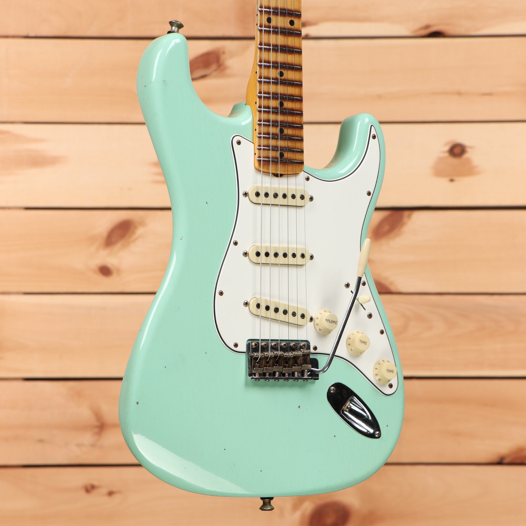 Fender Custom Shop Postmodern Stratocaster Journeyman Relic Aged Surf Green electric guitar with single-coil pickups