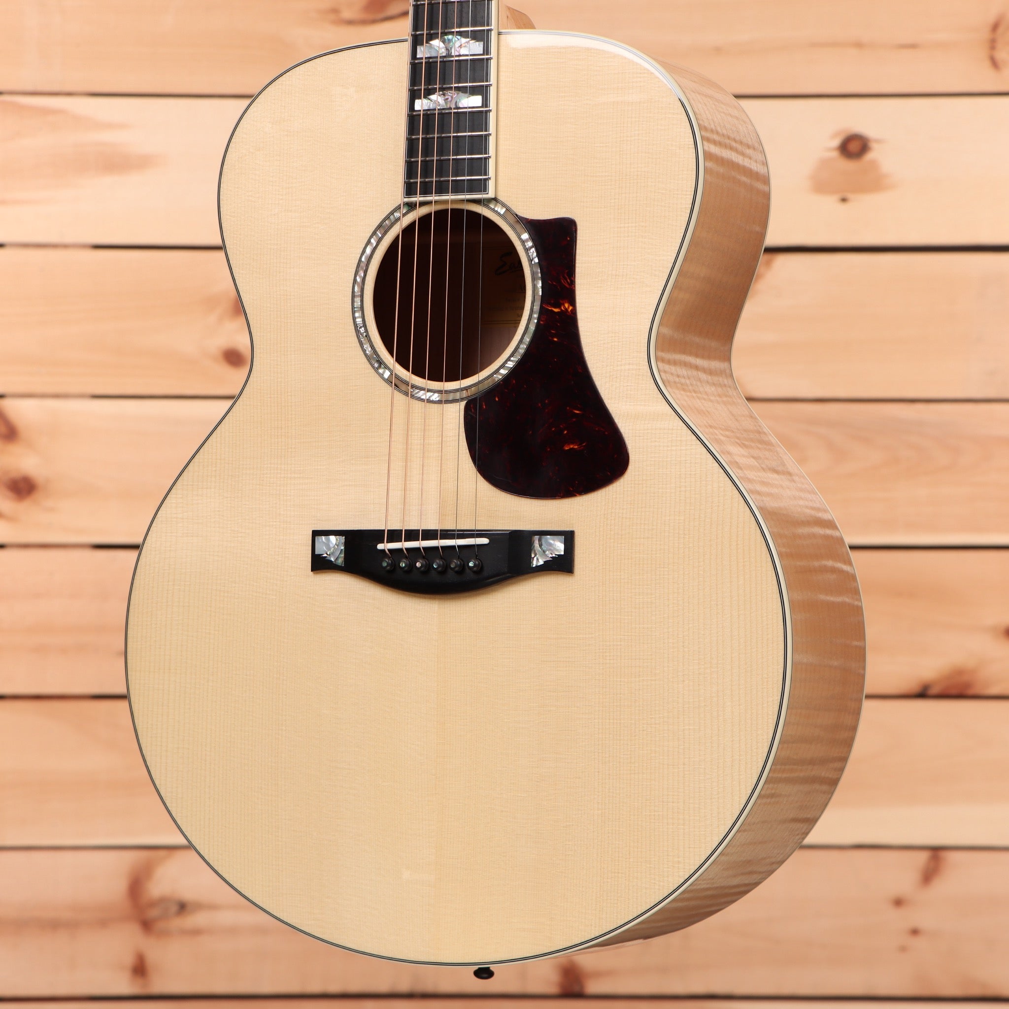 Eastman AC630-BD natural acoustic guitar with tortoiseshell pickguard and bound edges
