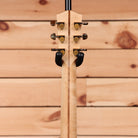 Eastman AC630-BD natural acoustic guitar with gold tuning machines and black buttons