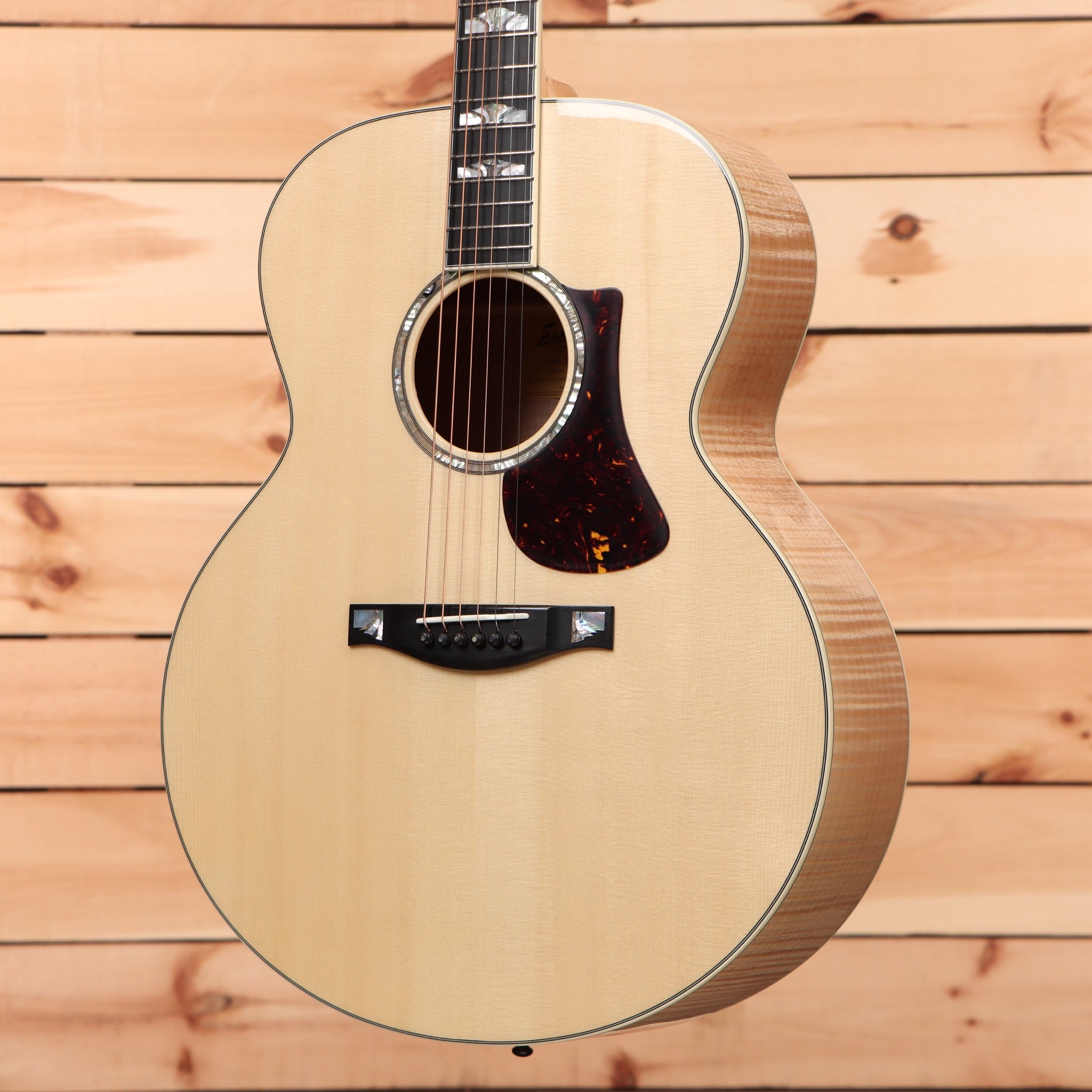 Eastman AC630-BD natural acoustic guitar with tortoiseshell pickguard and ebony fretboard