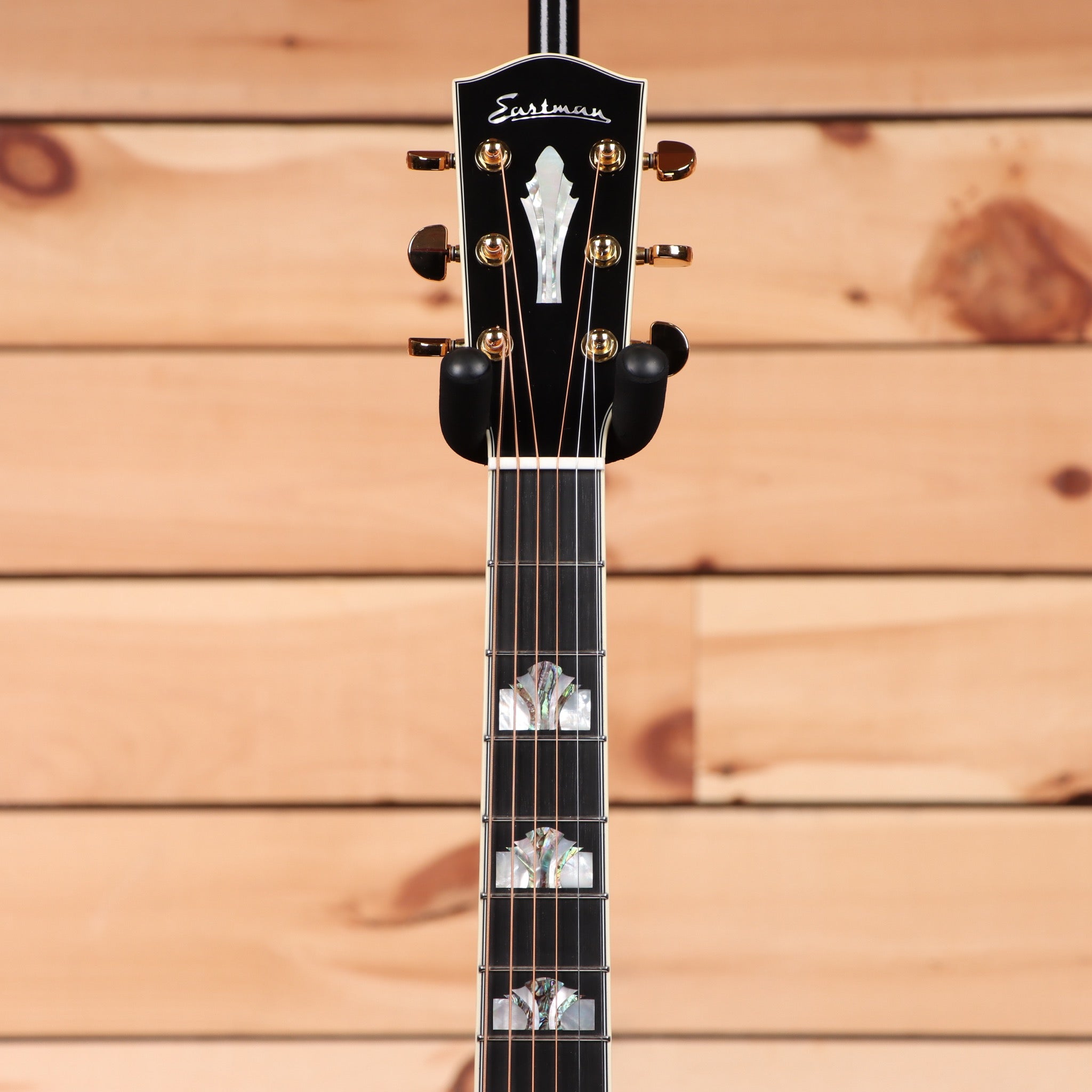 Eastman AC630 acoustic guitar natural finish with abalone inlays and gold tuners