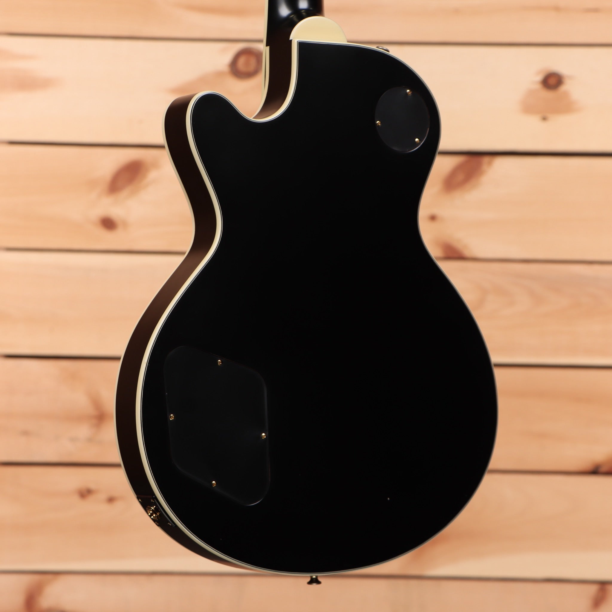 Eastman SB57-N semi-hollow body electric guitar black finish with cream binding and f-hole