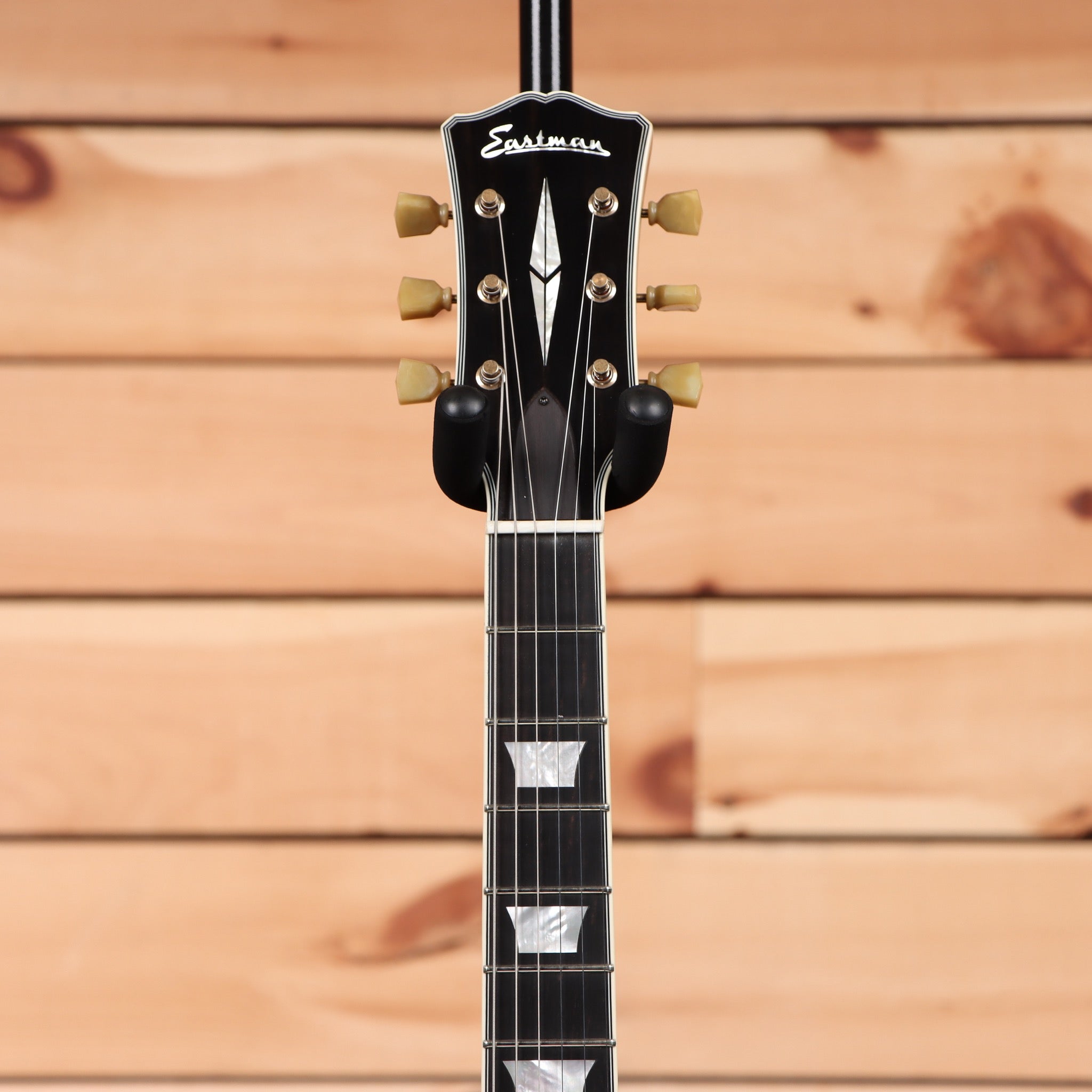 Eastman SB57-N semi-hollow body electric guitar black with maple neck and vintage-style tuners