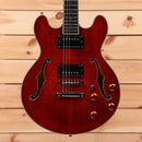 Eastman T184MX semi-hollow body electric guitar Classic Red with f-holes and gold hardware