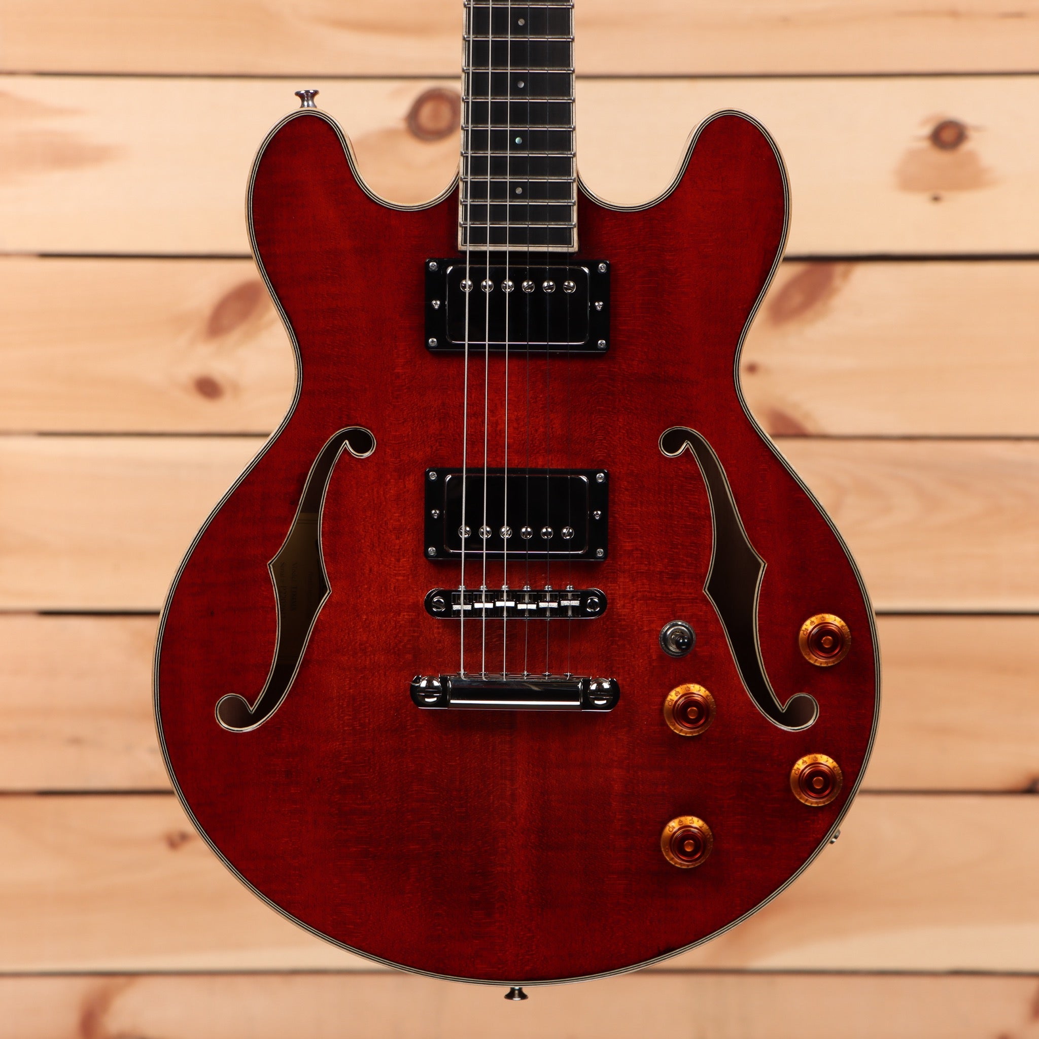 Eastman T184MX semi-hollow body electric guitar Classic Red with f-holes and gold hardware
