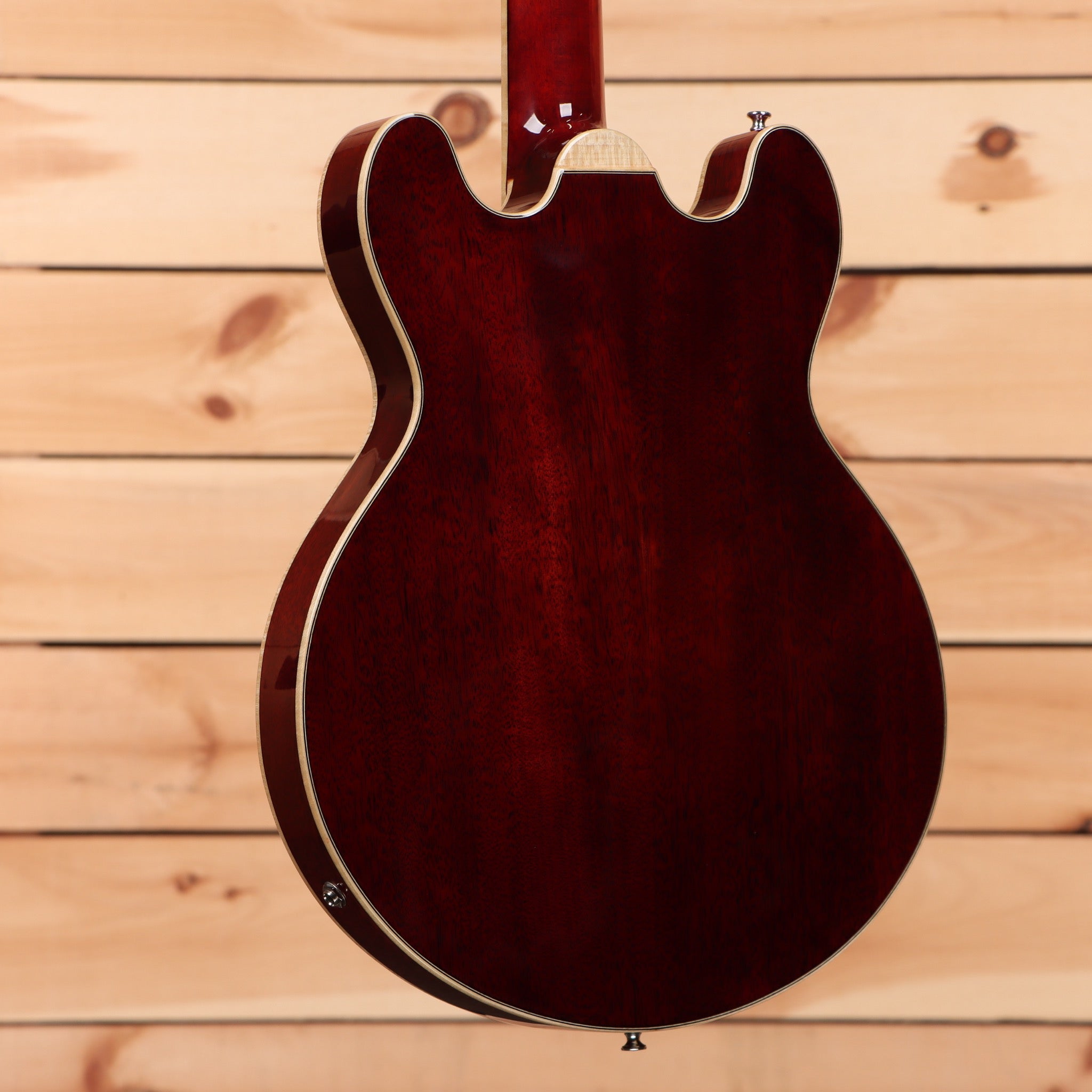 Eastman T184MX semi-hollow electric guitar classic red finish with f-holes and maple binding