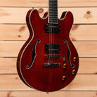 Eastman T184MX Classic semi-hollow electric guitar with amber knobs and f-holes