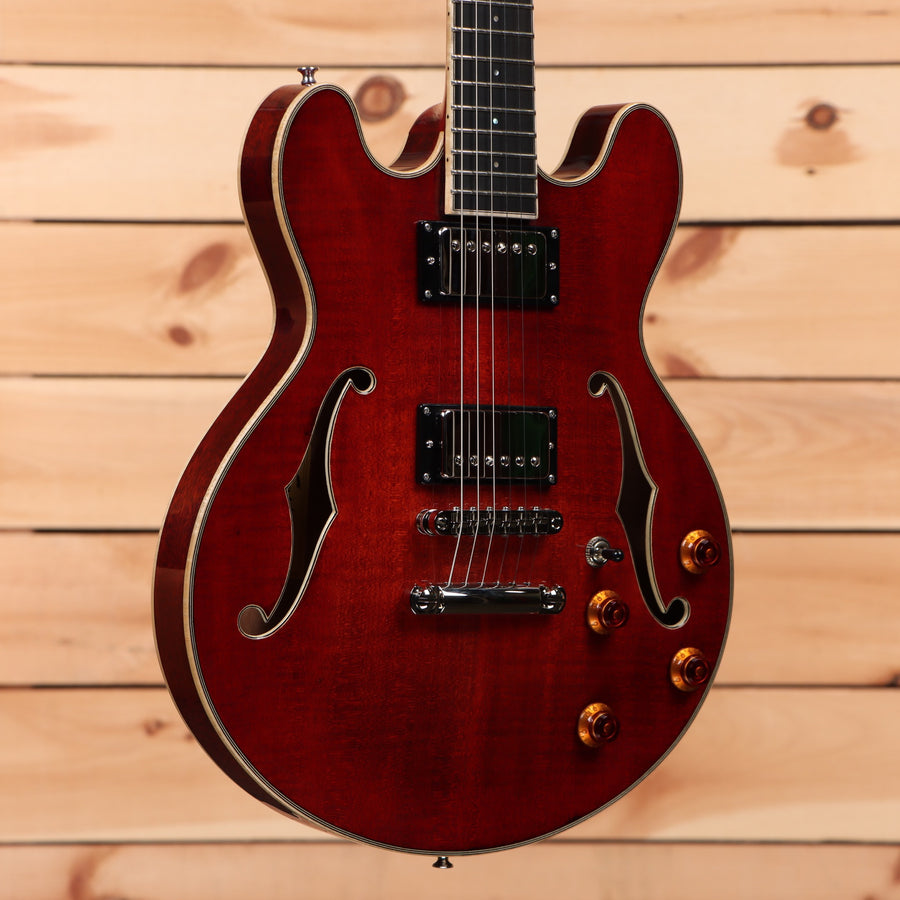 Eastman T184MX Classic semi-hollow electric guitar with amber knobs and f-holes