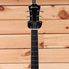 Eastman T184MX classic semi-hollow electric guitar with cream tuning pegs and black pickguard