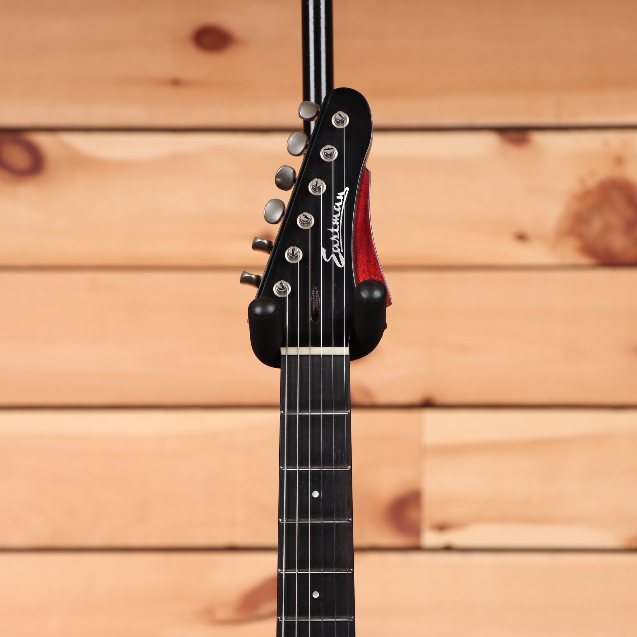 Eastman Juliet VBB electric guitar antique black varnish with red binding and chrome tuners