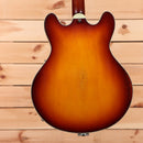 Eastman T64-V semi-hollowbody electric guitar Antique Goldburst with f-holes and cream binding