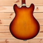 Eastman T64-V semi-hollowbody electric guitar Antique Goldburst with f-holes and cream binding