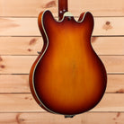 Eastman T64-V semi-hollow electric guitar Antique Goldburst with f-holes and cream binding
