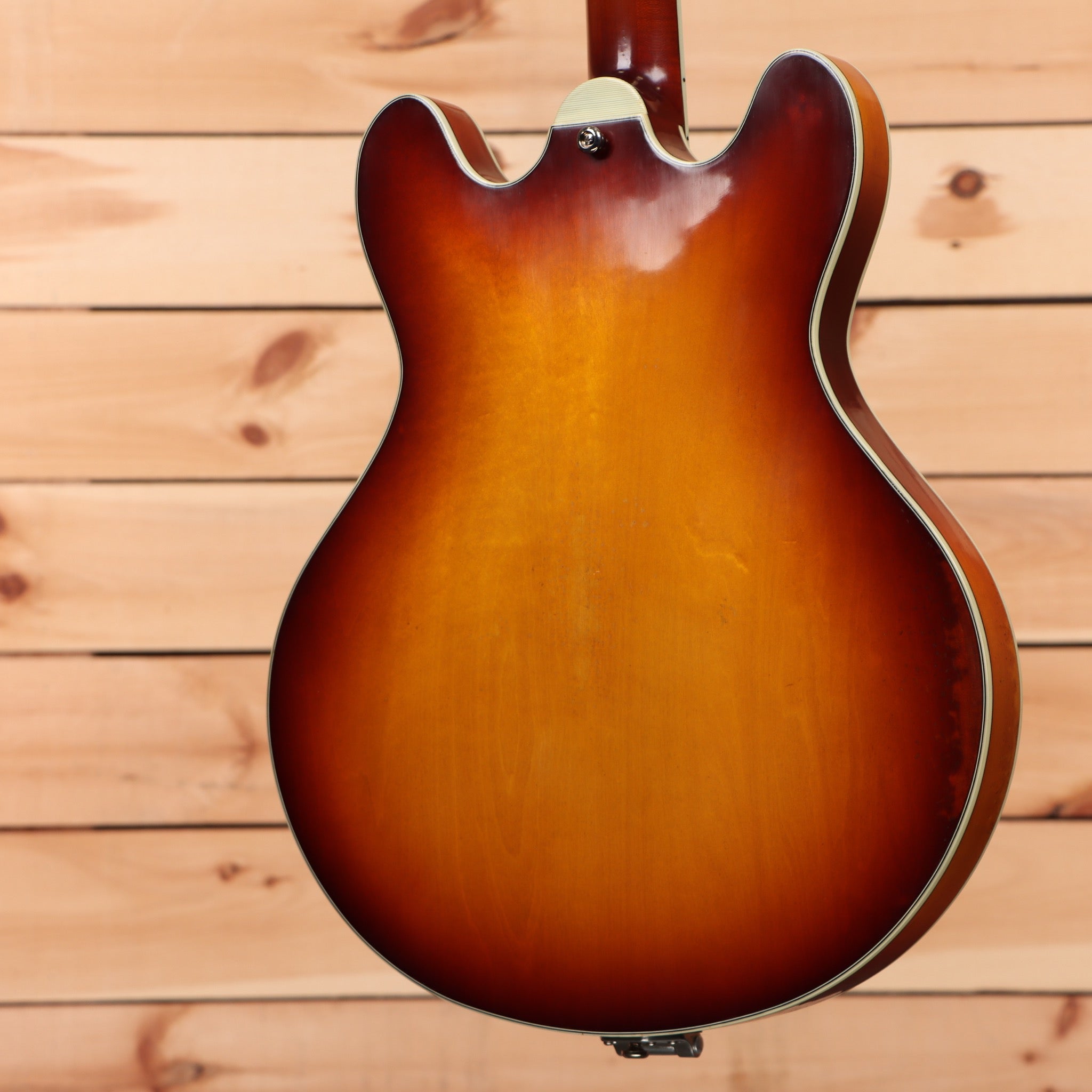Eastman T64-V semi-hollow electric guitar Antique Goldburst with f-holes and cream binding