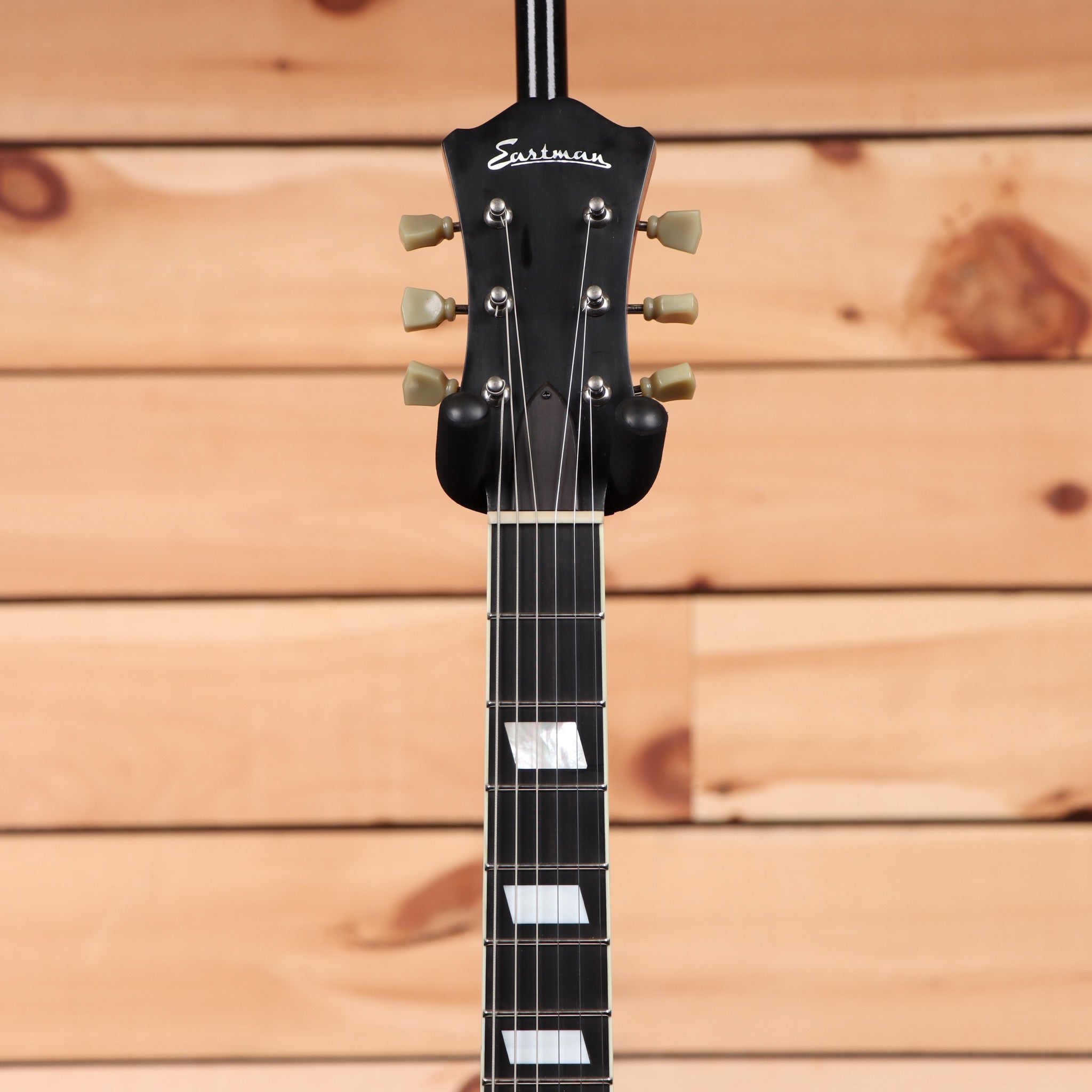 Eastman T64-V semi-hollow body electric guitar antique goldburst with f-holes and cream binding
