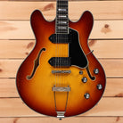 Eastman T64VT semi-hollow electric guitar Antique Goldburst with dual black pickguard humbuckers and f-holes