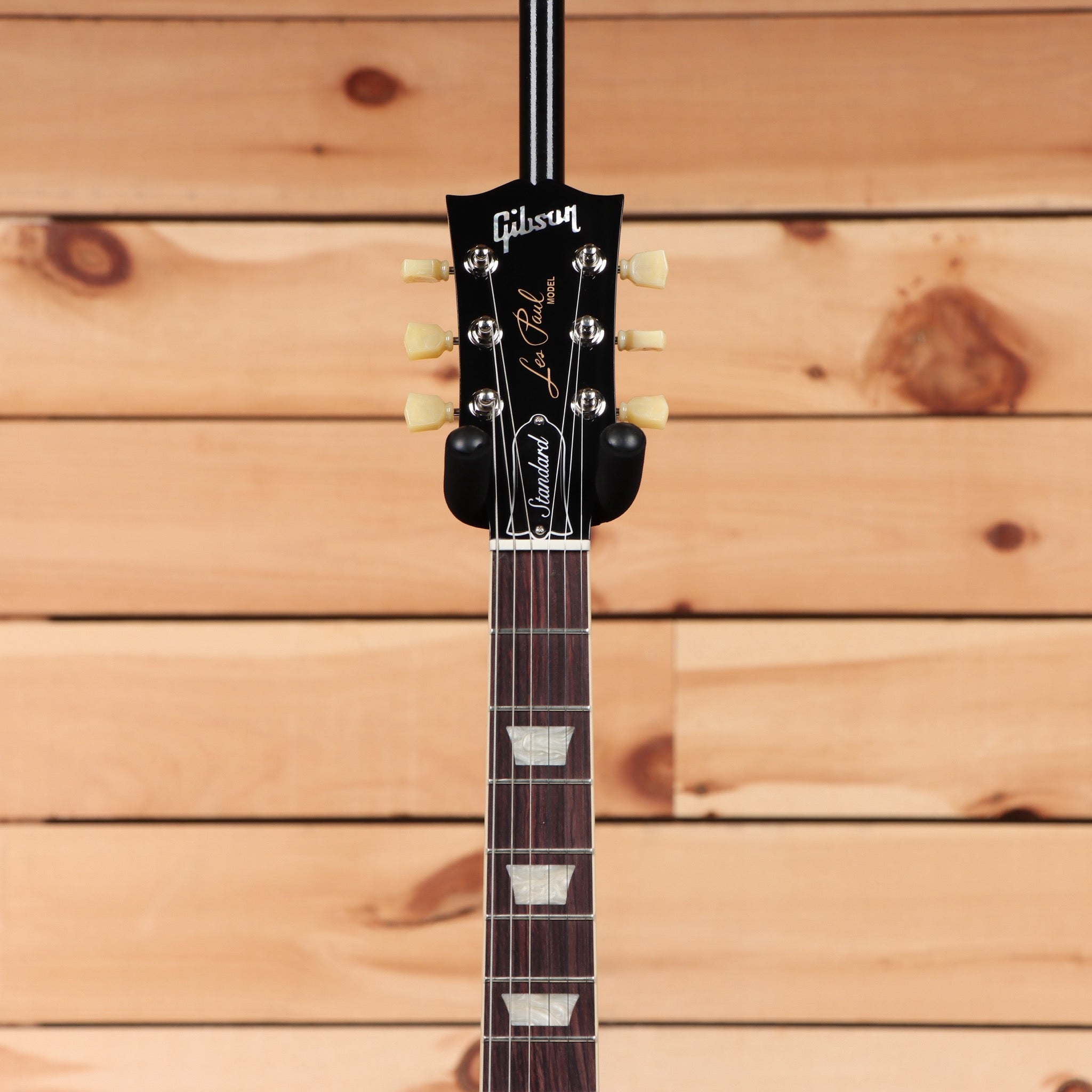 Gibson Les Paul Standard 50s P-90 Goldtop electric guitar headstock with rosewood fretboard and trapezoid inlays