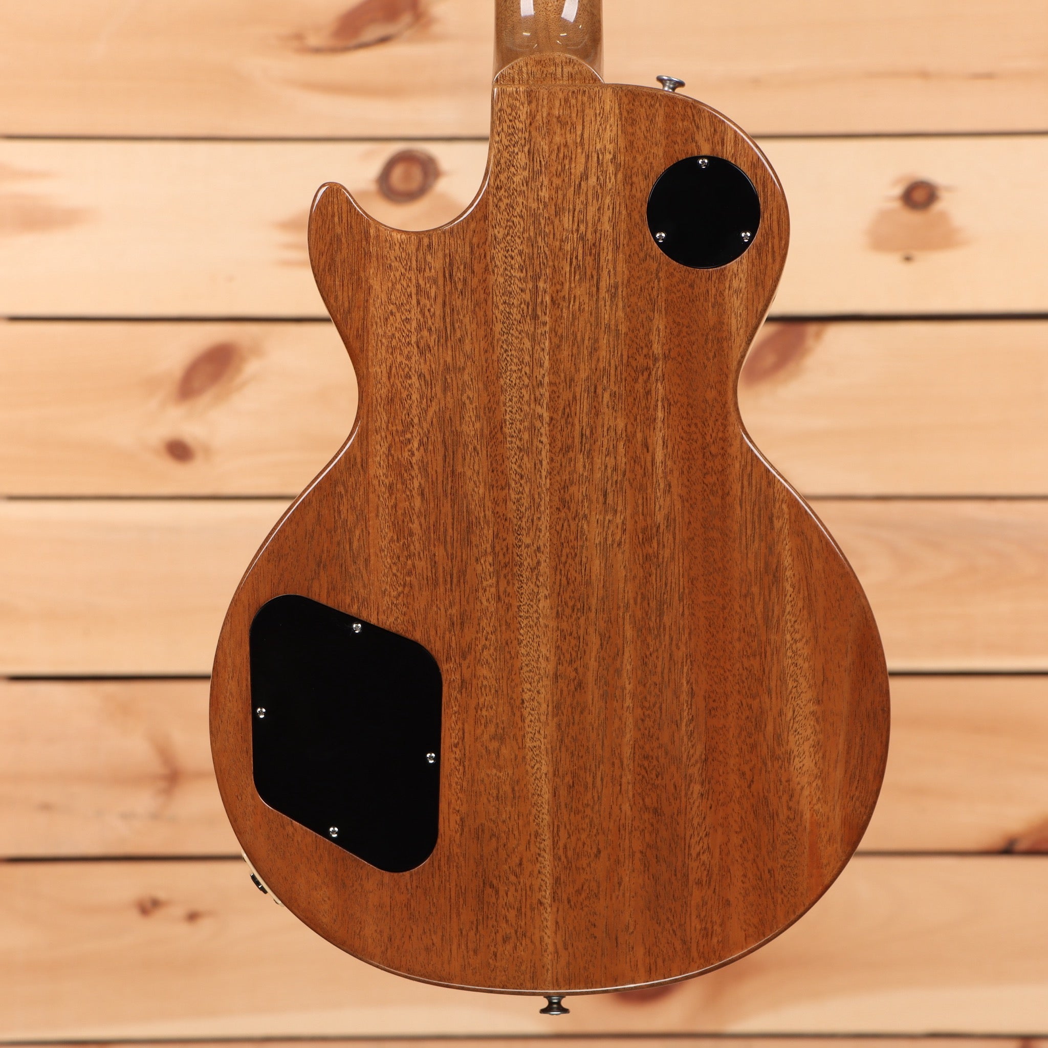 Gibson Les Paul Standard 50s P-90 Goldtop electric guitar back view showing natural mahogany body with black control covers