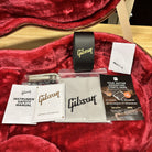 Gibson Les Paul Special TV Yellow guitar case interior with included accessories manual warranty card and polishing cloth