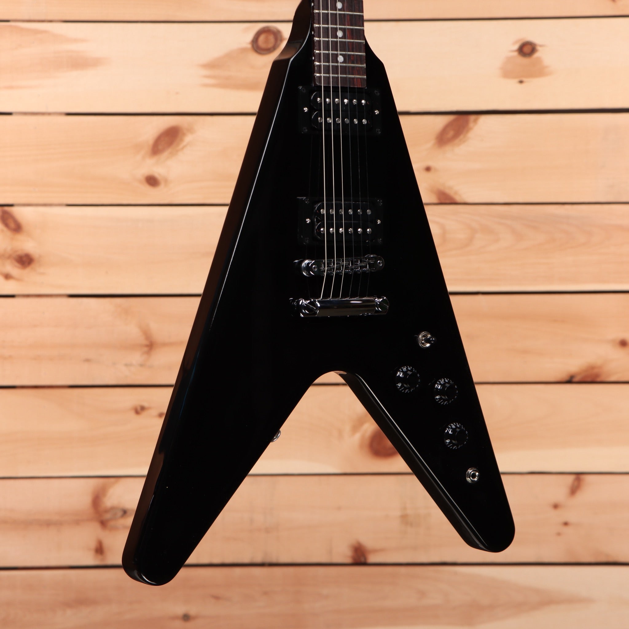 Gibson 80s Flying V Ebony electric guitar with dual humbucker pickups and angular body design