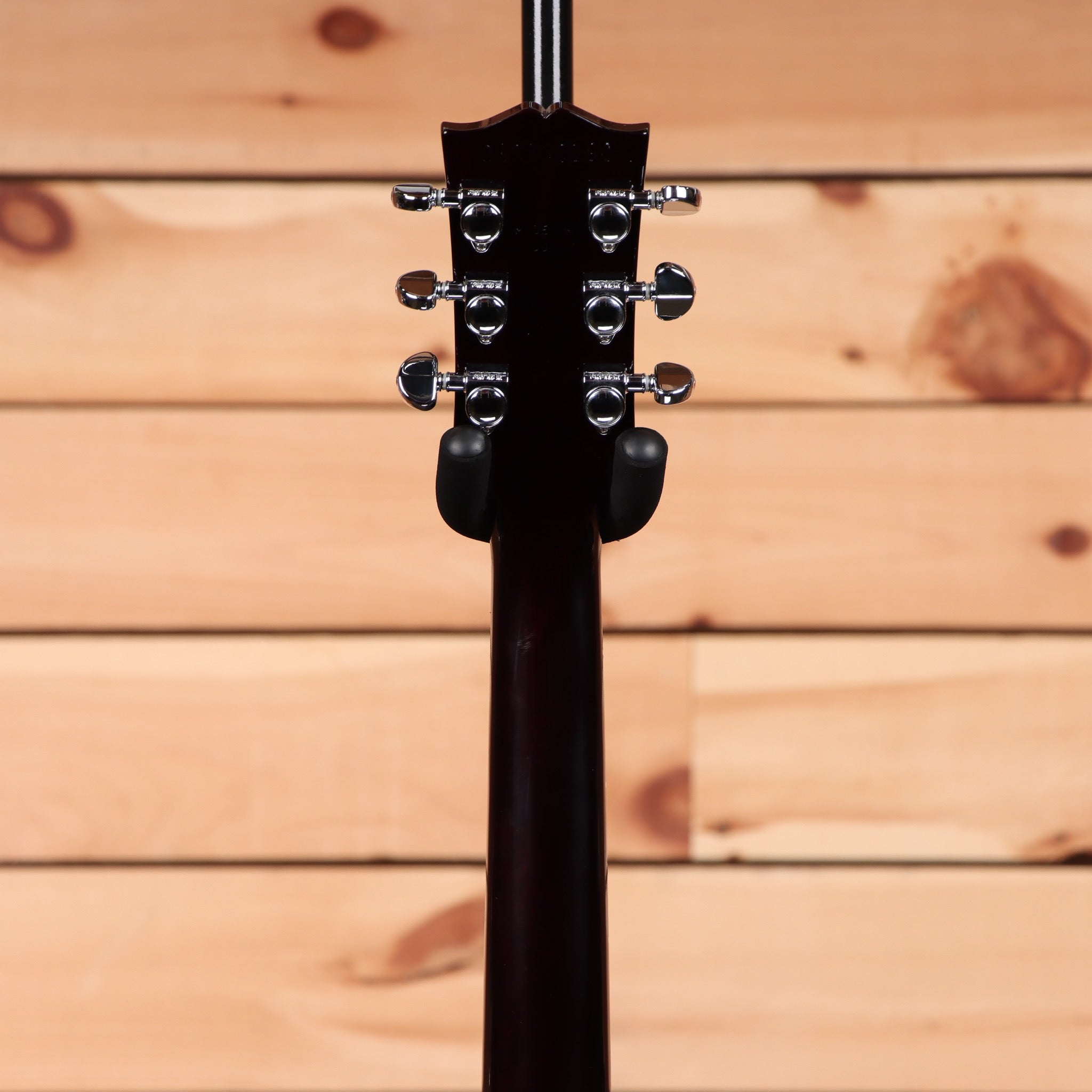 Gibson Les Paul Studio Smokehouse Burst electric guitar with chrome tuning machines and humbucker pickups