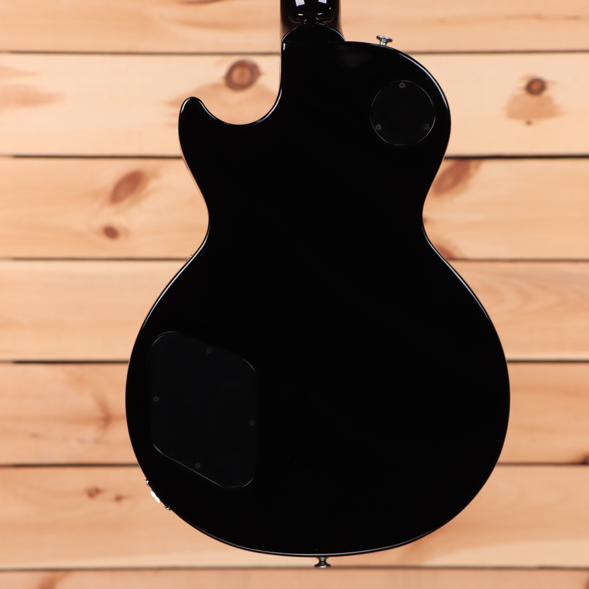Gibson Les Paul Studio Ebony electric guitar with dual humbucker pickups and arched top